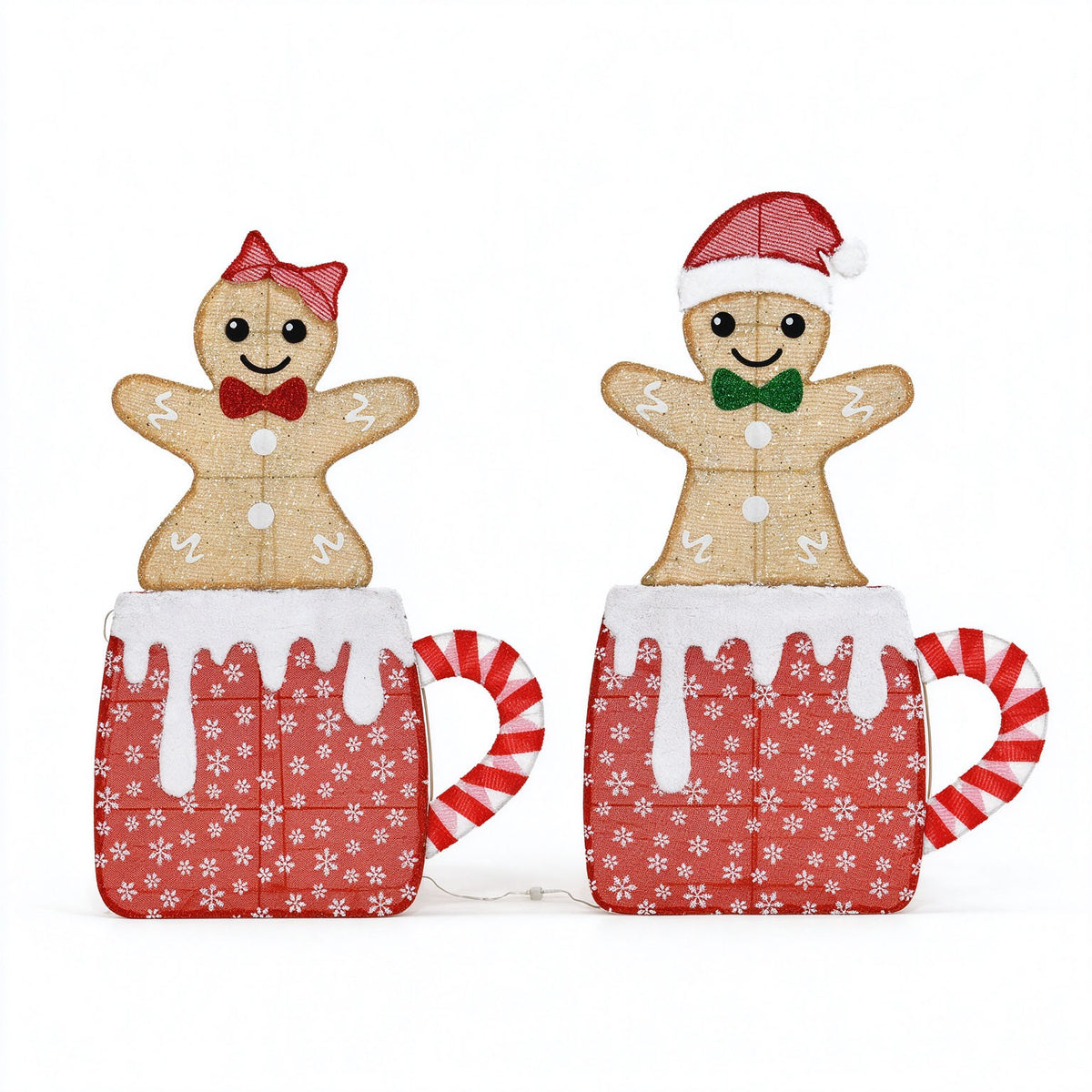 40" Set of 2 lighted 2D tinsel gingerbread couple decorations, featuring cute gingerbread figures sitting inside festive Christmas mugs, plug-in powered with warm glowing lights.